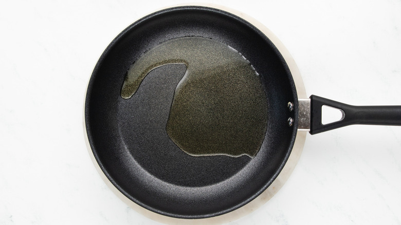 heating oil in frying pan