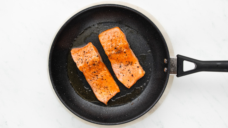 frying trout in pan