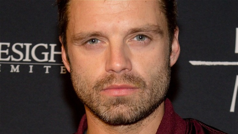 unsmiling Sebastian Stan