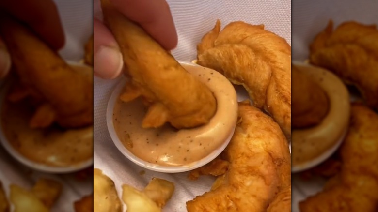 naked chicken fingers with sauce