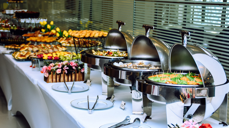 Buffet with assortment of breads and appetizers