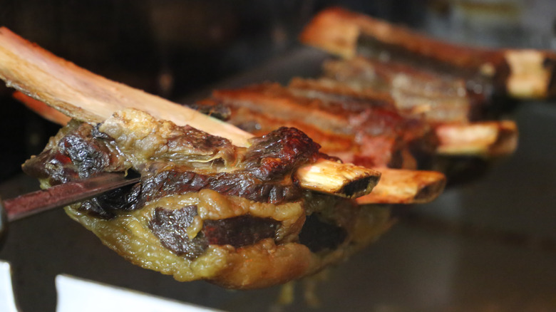 Grilled beef ribs on a skewer