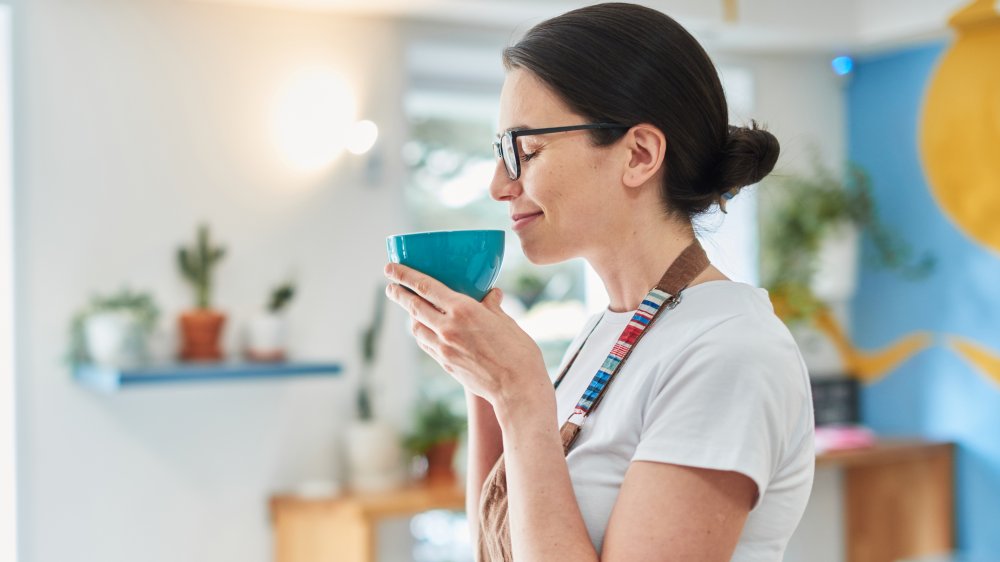 barista drinking coffee