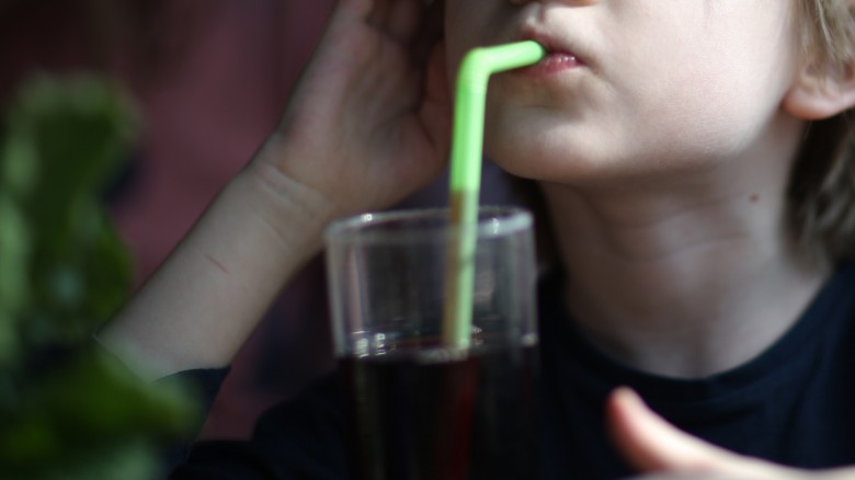 boy with drink at Olive Garden