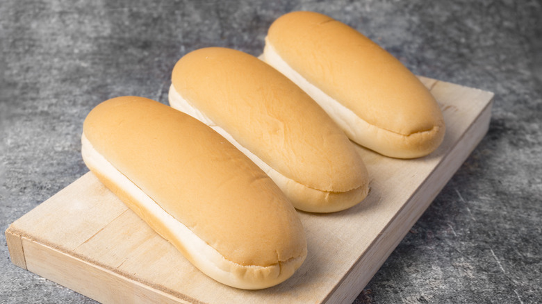 Hot dog buns on chopping block