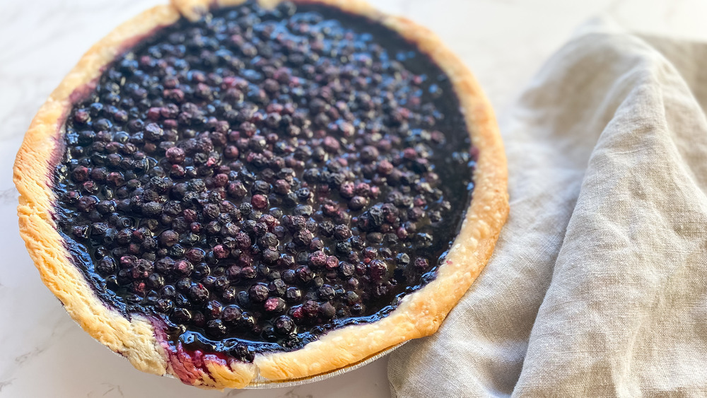 Blueberry pie with Maine blueberries and towel