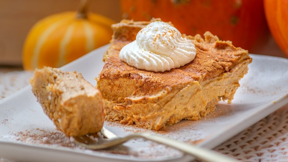 Pumpkin pie with whipped cream