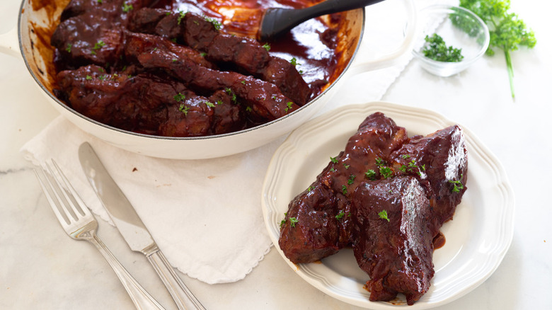 bowl of saucy ribs