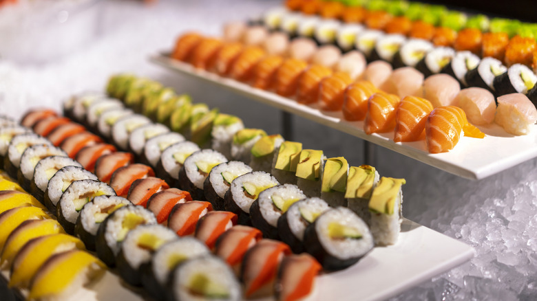 Sushi lined up at buffet restaurant