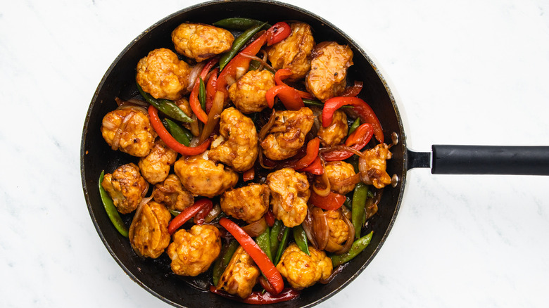 Cauliflower stir fry in pan