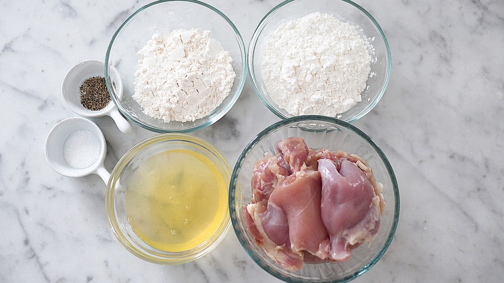 ingredient for sesame chicken on white countertop