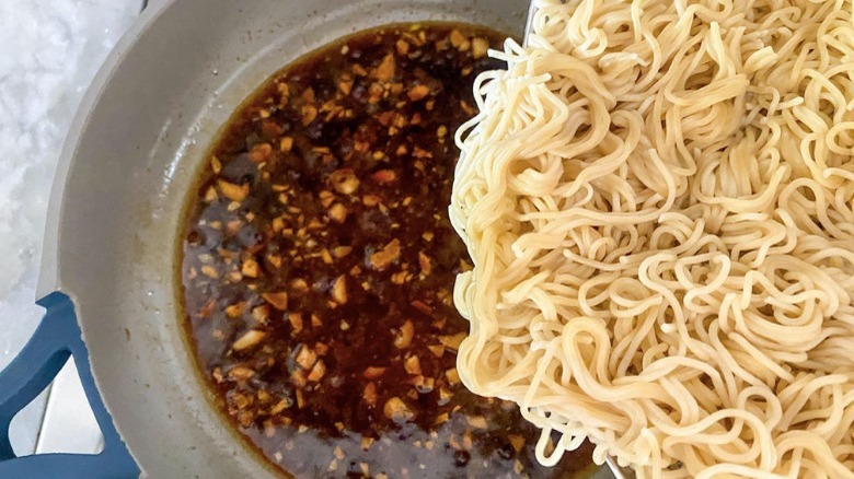 sauce and noodles in a skillet