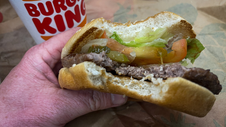 Person eating a Whopper