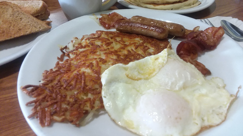 Eggs, hash browns, sausages, bacon