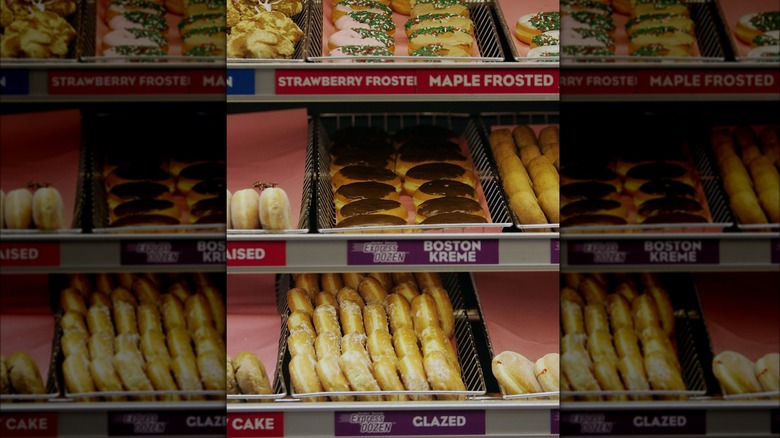 Trays of donuts in store