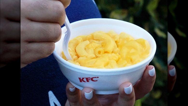 Person eating KFC Mac & Cheese 