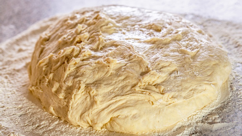 Rolled dough on table 