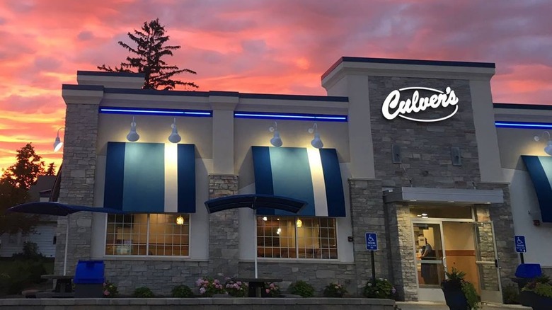 Culver's location with gold, rose, and purple sunset behind the building