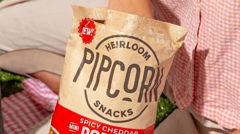 Eating pipcorn out the bag 