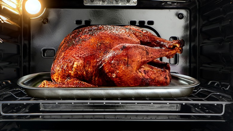 turkey roasting in oven