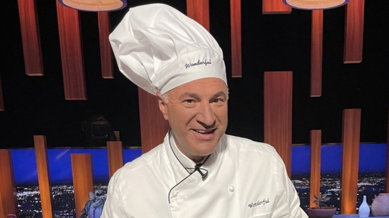 Kevin O'Leary wearing chef hat and coat