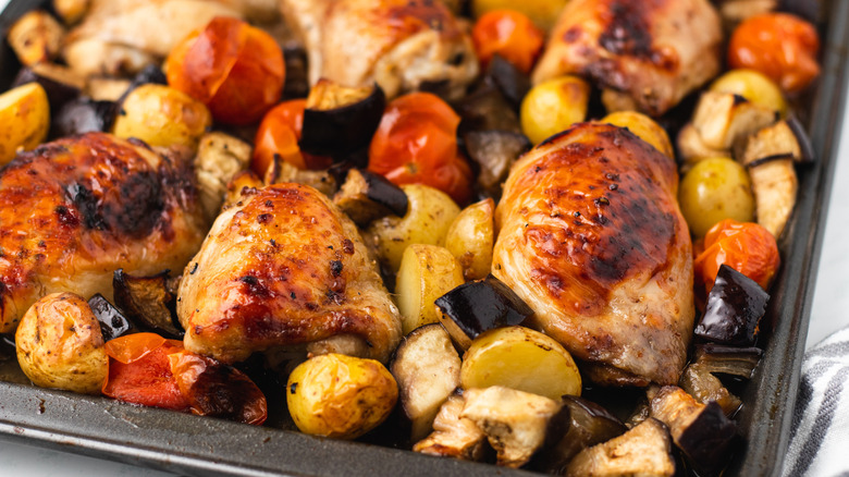 Sheet pan chicken and veg on baking sheet