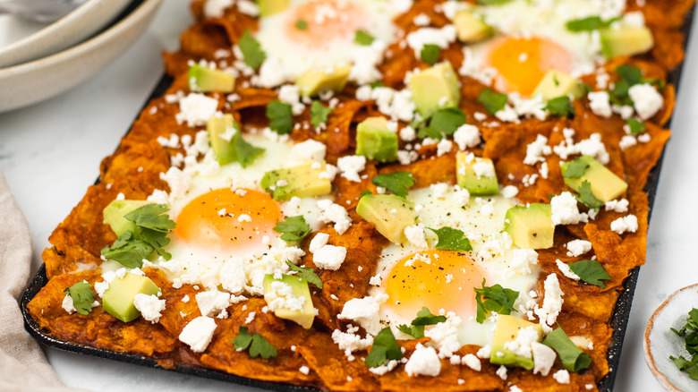 chilaquiles rojos on baking sheet