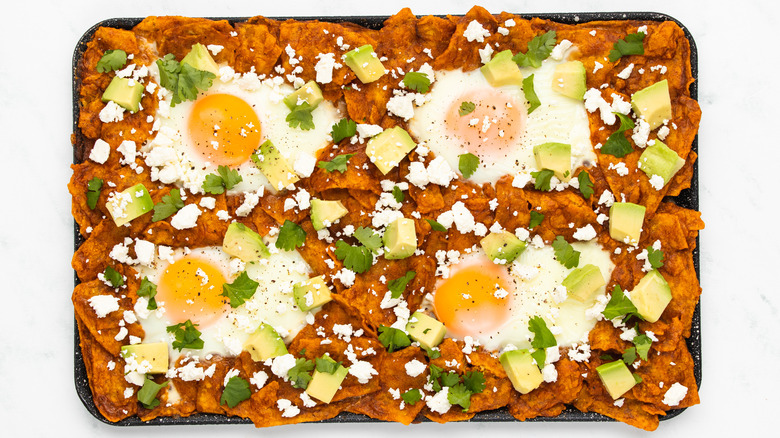 chilaquiles rojos on baking sheet