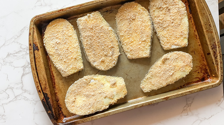 eggplant slices on baking pan