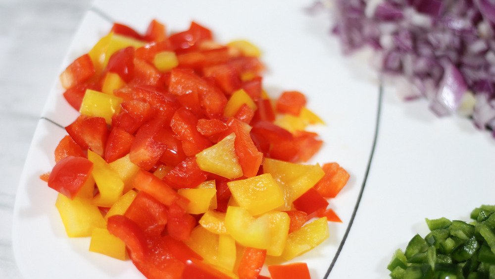 chopped produce for sheet pan nachos