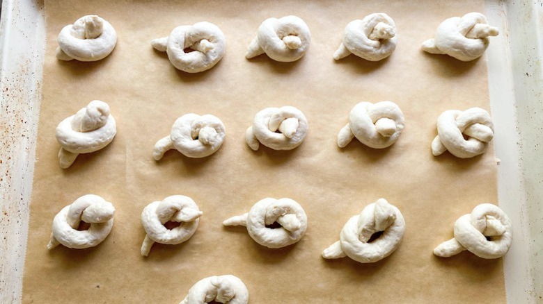 garlic knot dough on parchment paper