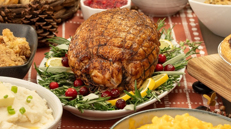 Costco's premade Thanksgiving with turkey, mashed potatoes, and pie on a table