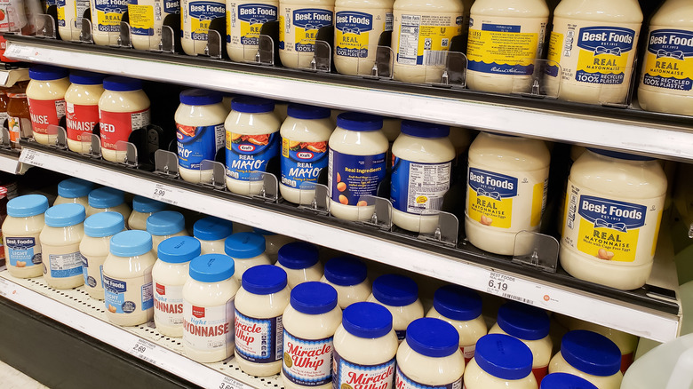 Mayonnaise jars on grocery store shelf