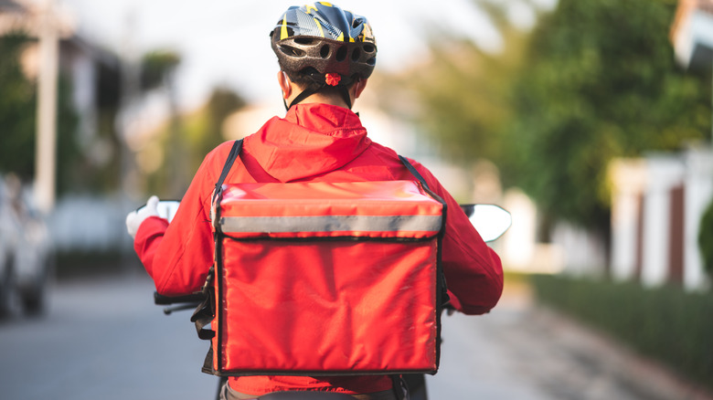 Food delivery person on bike