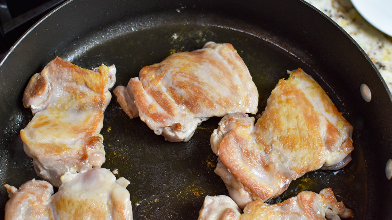 chicken thighs in skillet 