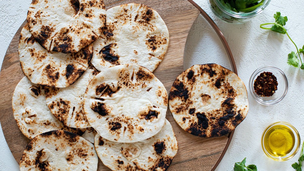 Charred tortillas for shrimp tacos