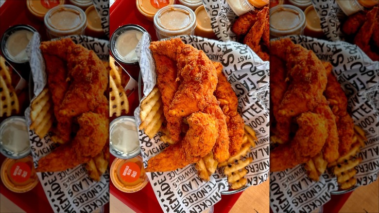 Fried chicken and waffle fries in basket