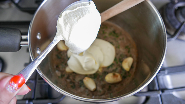 bagna cauda ingredients in saucepan 