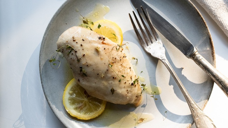 chicken on plate with lemon