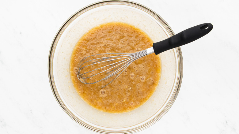 Mixing muffin ingredients in bowl