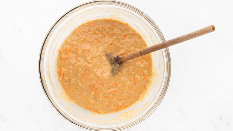 Carrot muffin batter in mixing bowl