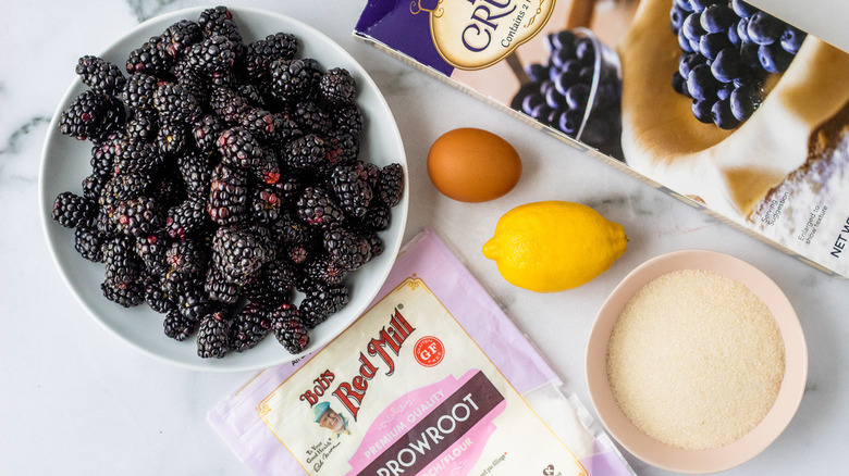 ingredients for blackberry cobbler pie on counter