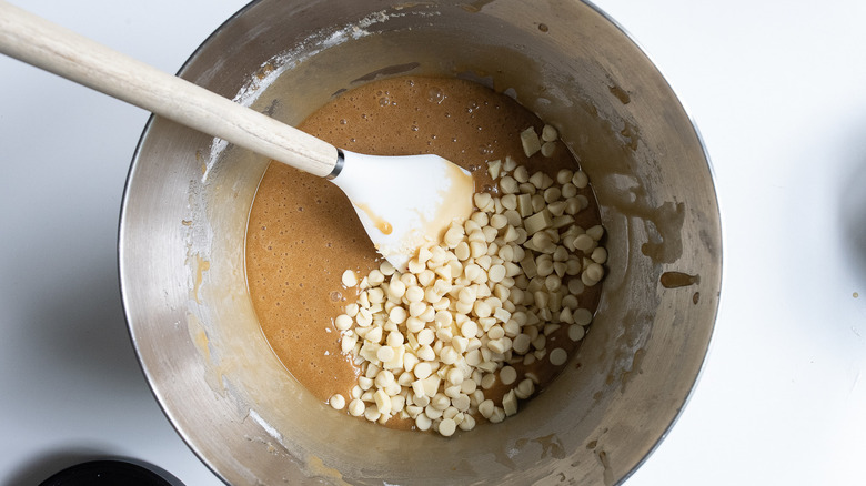 mixing in white chocolate bits