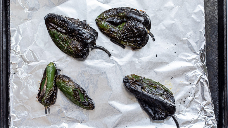 broiled poblanos and jalapenos