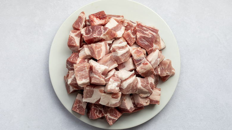 chopped pork cubes on plate