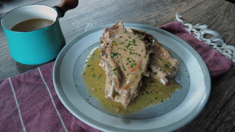 plated crock pot pork chops with sauce
