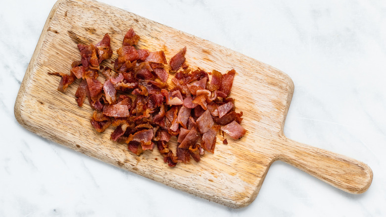 chopped bacon on cutting board 