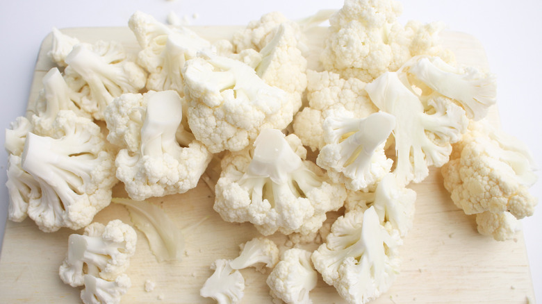 chopped cauliflower on cutting board