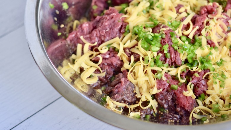 ground venison with cheddar and jalapeños in bowl