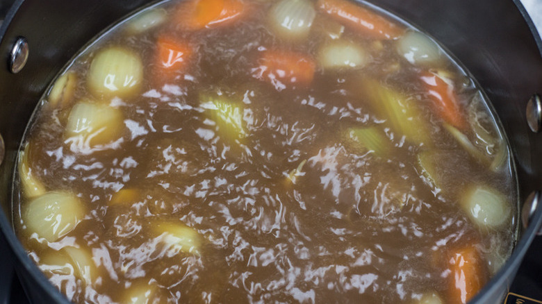 Boiling soup in a pot